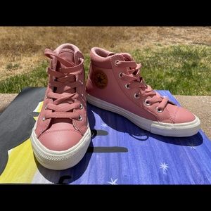 Pink fleece lined hi top converse hiking boots!